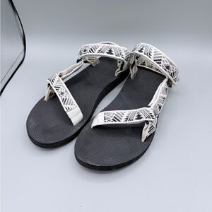 Teva Black Footbed Sandals with White Patterned Straps